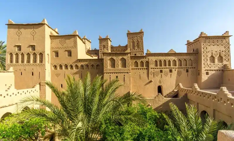 The majestic palace of the Sultan of Morocco stands proudly amidst the vast desert landscape, showcasing rich heritage.