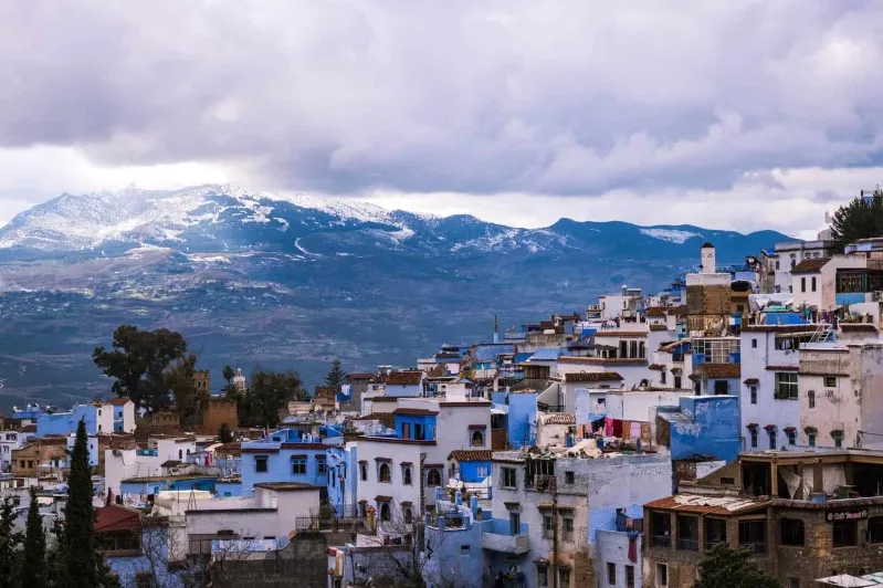 A picturesque view of Chefchaouen, Morocco, showcasing its iconic blue buildings, a must-visit destination in the country.