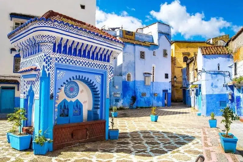 A scenic view of Chefchaouen, Morocco, showcasing its iconic blue buildings, perfect for private Morocco tours. 