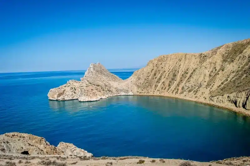 A stunning view of the blue sea and cliffs along the Kazakhstan coast, reminiscent of Morocco beach holidays.
