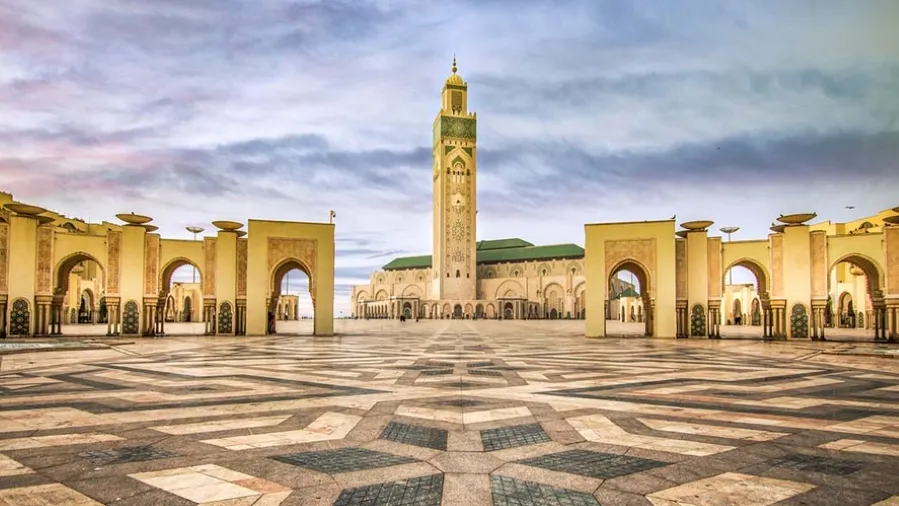 A stunning view of the mosque in Casablanca, Morocco, showcasing its intricate architecture and cultural significance.