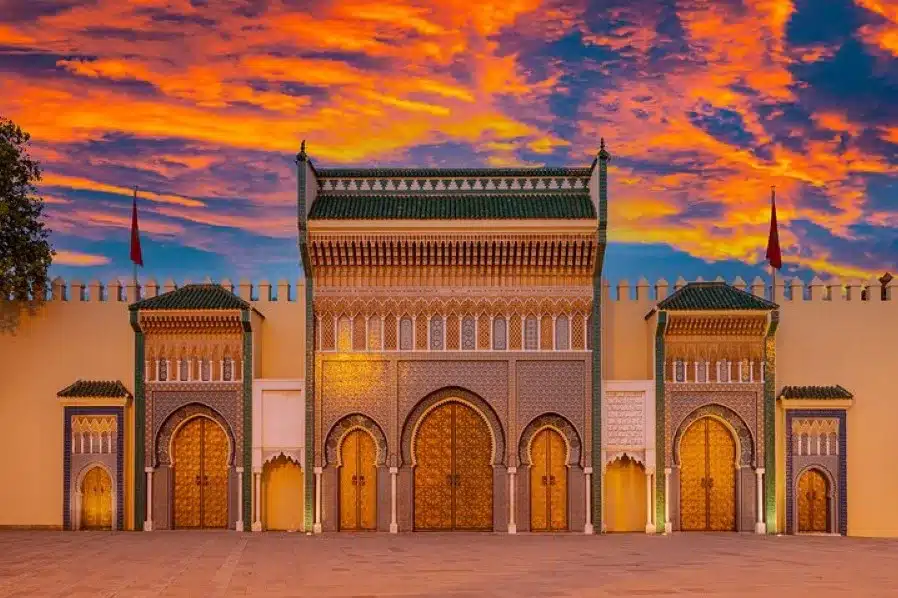 Entrance to the Moroccan king's palace, showcasing intricate architecture, ideal for private Morocco tours.