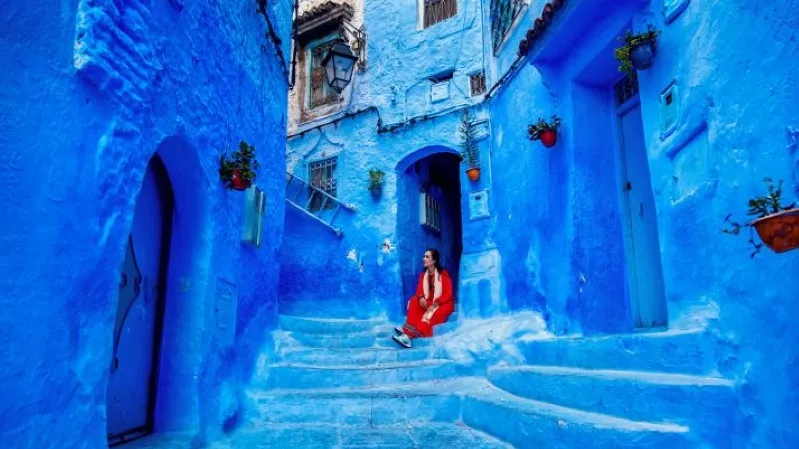 A picturesque view of Chefchaouen, Morocco, showcasing its iconic blue buildings and vibrant streets in the blue city. 
