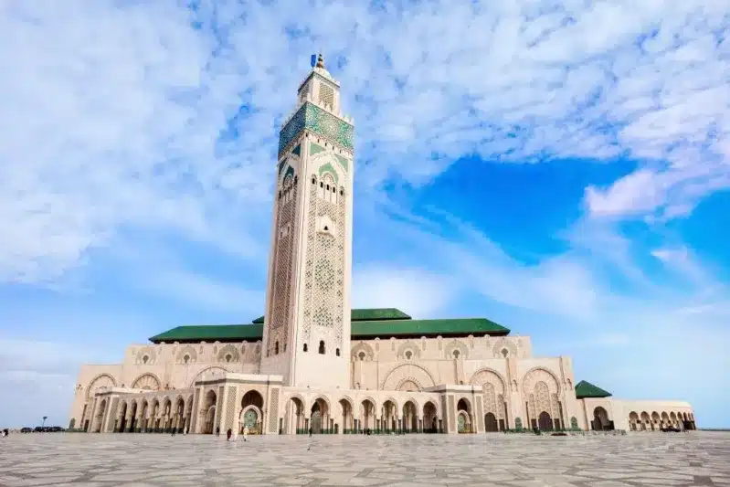 Majestic Islamic mosque in Casablanca, Morocco, highlighting its architectural grandeur, ideal for those exploring Morocco travel deals.