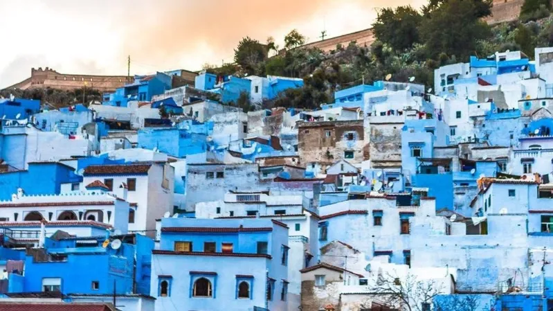  An enchanting glimpse of Chefchaouen, Morocco, known for its stunning blue architecture, ideal for those touring in morocco. 