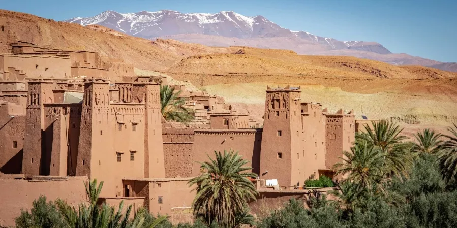 A panoramic view of Morocco's city, nestled among majestic mountains, showcasing its rich historical sites.