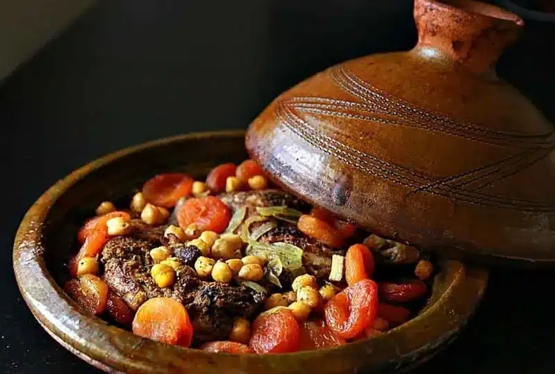 A vibrant Moroccan chicken and chickpea stew, showcasing the rich flavors of Best Food in Marrakech. 