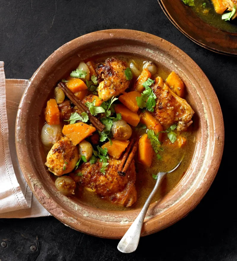 A vibrant bowl of Moroccan stew filled with hearty carrots and potatoes, representing the essence of best moroccan food.