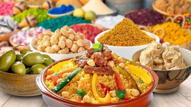 A selection of diverse foods in bowls, featuring a rich bowl of harira soup among other dishes.
