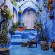 Scenic view of Chefchaouen, Morocco, showcasing its iconic blue buildings and mountainous backdrop, a must-visit destination.