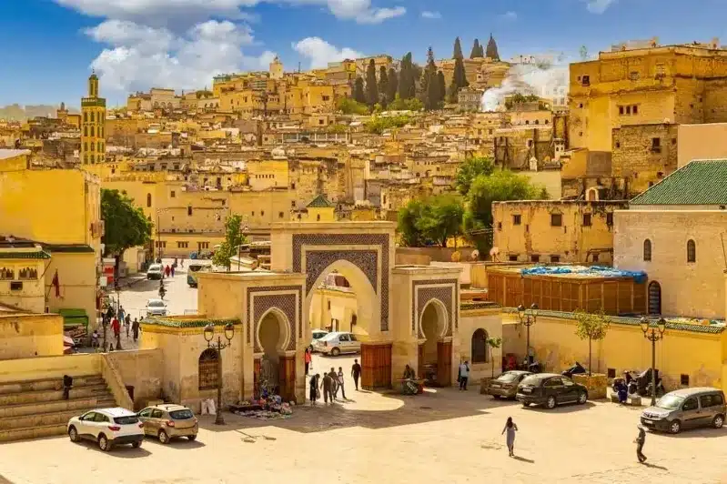 A panoramic view of Marrakech, Morocco, showcasing its vibrant architecture and bustling streets, Morocco without visas.