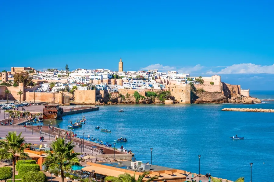 A panoramic view of Marrakech, Morocco, showcasing its vibrant architecture and bustling streets. Visit Morocco.