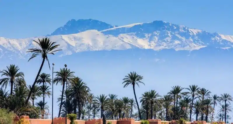 Snow-capped mountains in Morocco, showcasing the country's the unique things to do in Morocco. 