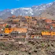 A scenic view of the Berber village of Atlas nestled in the Atlas Mountains of Morocco, showcasing traditional architecture.