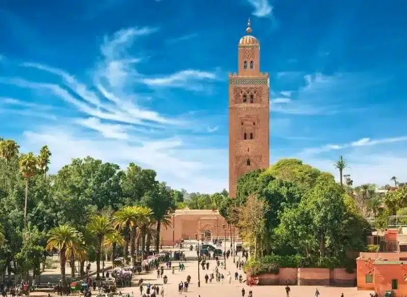 A scenic view of Marrakech, showcasing its vibrant architecture and culture, inviting travelers from the USA to explore Morocco.