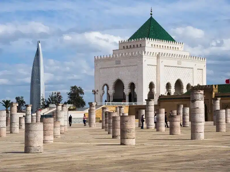 Mosque and Bab El-Azizia tower in Rabat, Morocco, showcasing iconic architecture and cultural heritage.