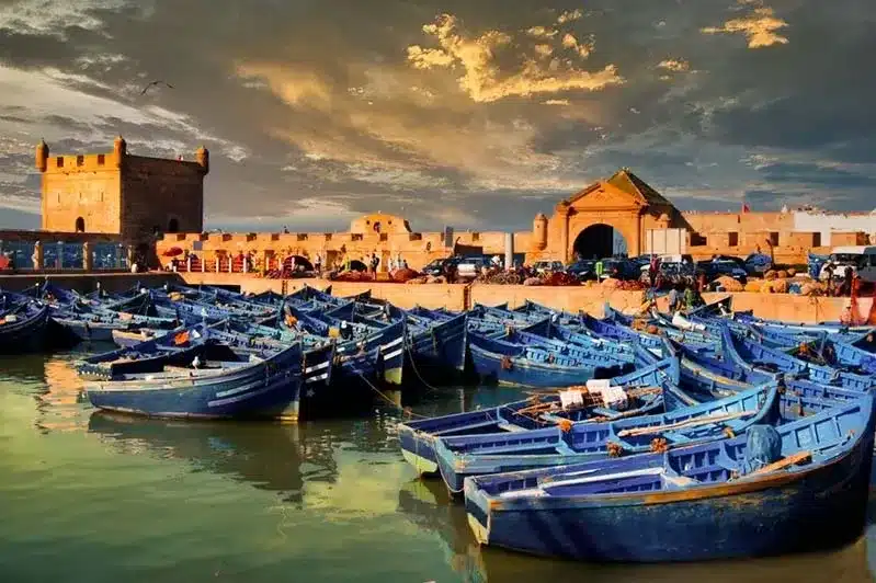 Fishing boats in the harbor of Fes, Morocco, showcasing the vibrant maritime culture of the old city. 