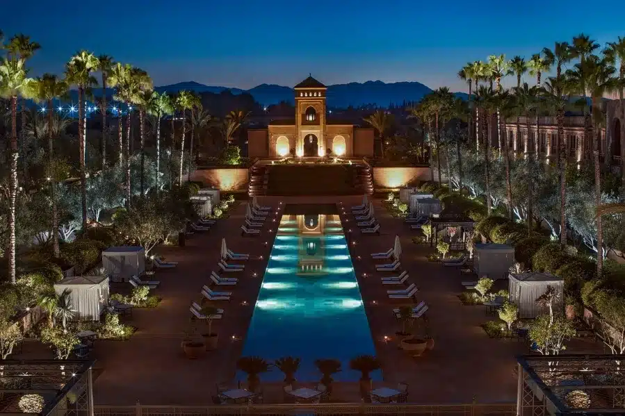 Marriott Marrakech Hotel exterior with palm trees, inviting travelers from the USA to explore Morocco's vibrant culture.