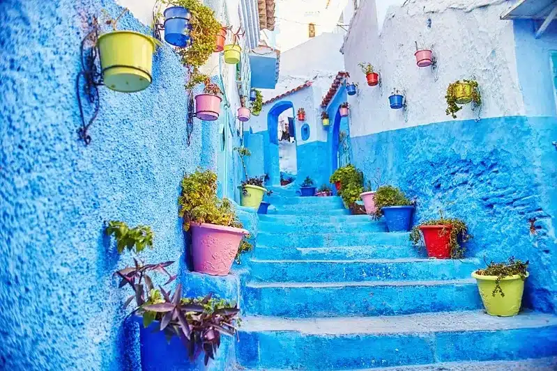 Scenic view of Chefchaouen, Morocco, showcasing its iconic blue buildings, a highlight for travelers exploring the region.