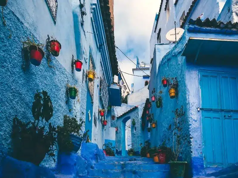 Blue streets of Chefchaouen, Morocco, showcasing vibrant architecture, a popular destination for travelers.