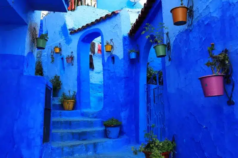 Scenic view of Chefchaouen, Morocco, showcasing its iconic blue buildings and vibrant streets, ideal for custom tours.