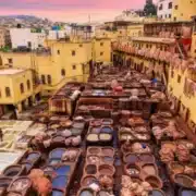 Vibrant buildings in Marrakech showcase the city's rich culture, promoted by the best travel agency in Morocco.