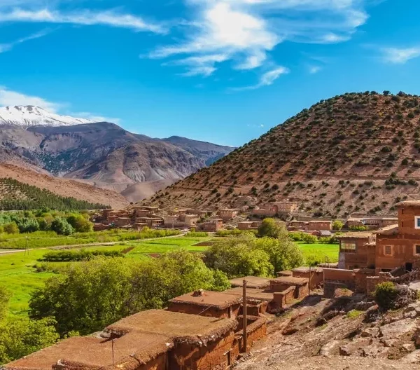 Scenic view of the Atlas Mountains in Morocco, showcasing the Ait Bouguemez Valley during a trek from Marrakech.