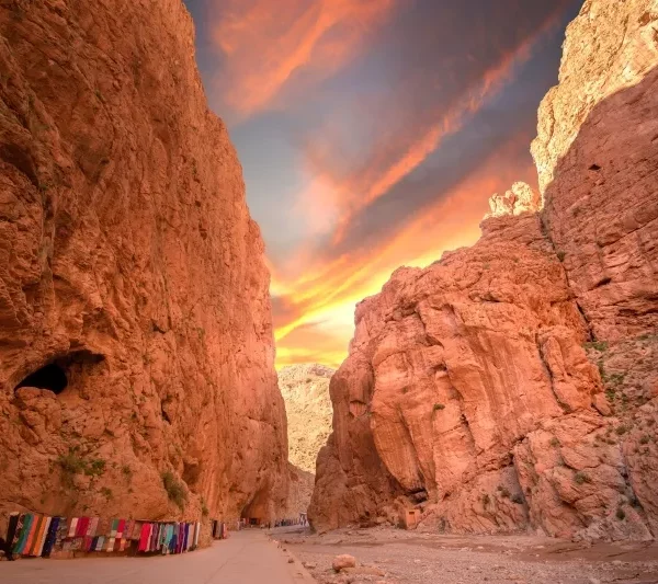The sun sets over the Wadi al-Jebel canyon, casting warm hues across the landscape during a 2 Days Ouarzazate.