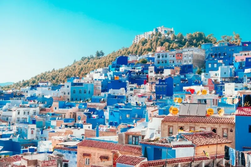 Scenic view of Chefchaouen, Morocco, known for its blue-washed buildings, ideal for solo travelers exploring unique destinations.