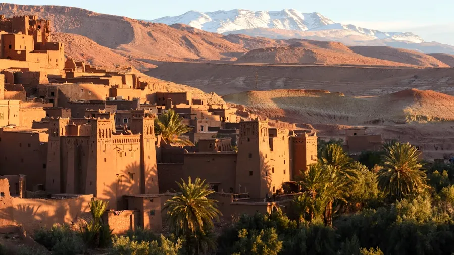 A panoramic view of Atad, a city in Morocco, showcasing its unique architecture against the backdrop of the Sahara Desert.