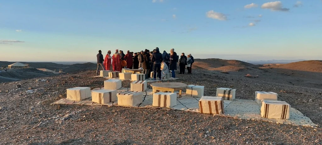 Agafay Desert Sunset Gathering with Berber Musicians and Traditional Rugs